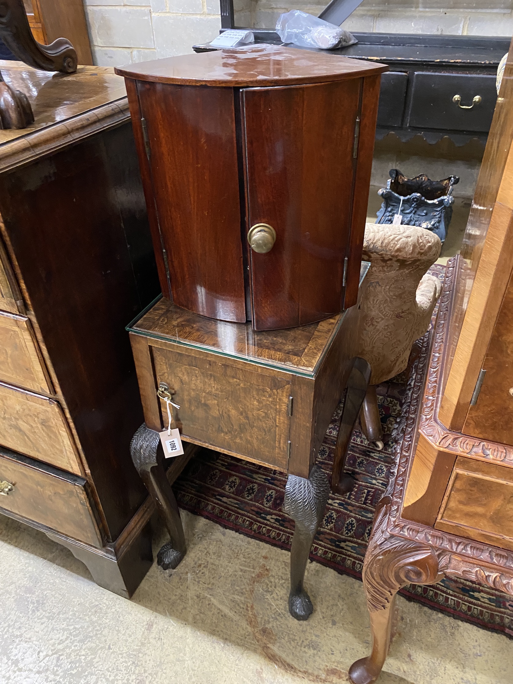 A Victorian rosewood revolving piano stool, a George III style mahogany dressing stool, bedside cabinet and as corner cabinet